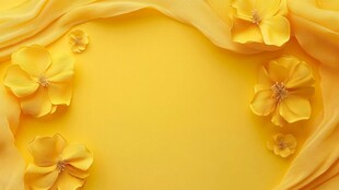 黄色绸布与花朵装饰背景