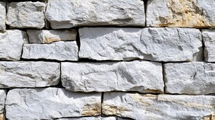 灰色石砌墙面纹理特写