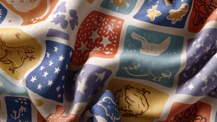 多彩卡通图案印花布料