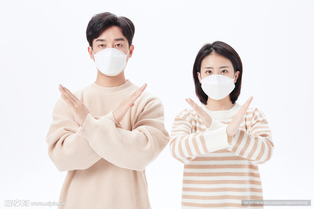 佩戴口罩的青年男女拒绝手势