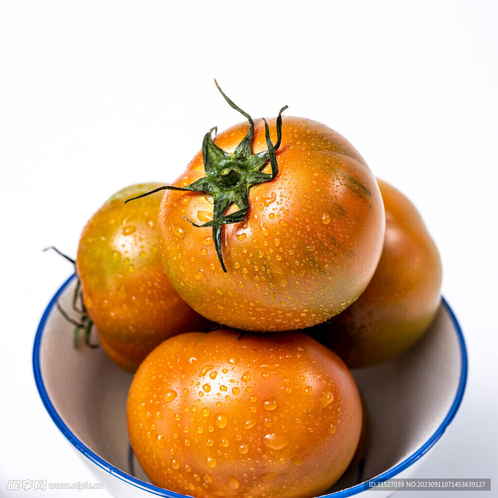 碗里的柿子摄影图