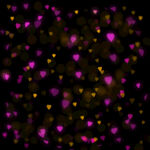 飞舞爱心光效光晕粒子背景