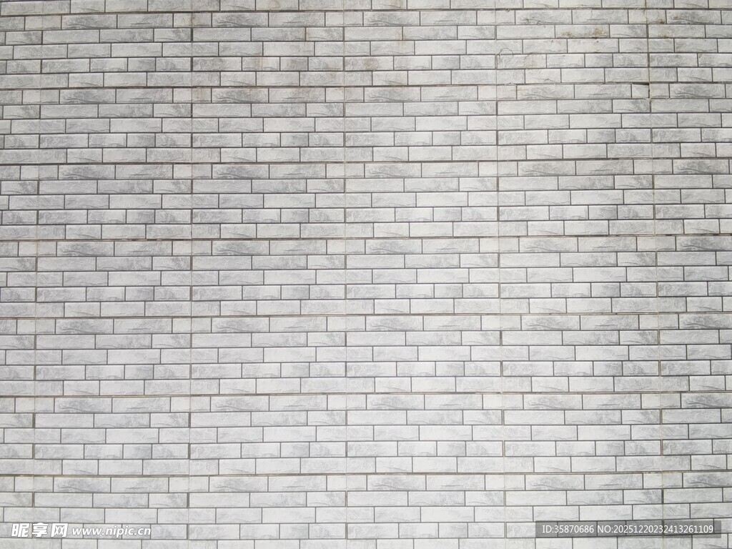 浅灰色纹理砖墙背景图