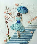 撑蓝伞漫步的梦幻女孩