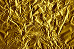 金色褶皱纹理背景图