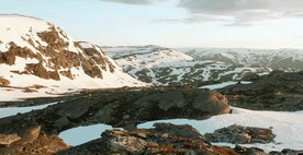 鸟瞰雪山航拍海岛小镇自然风光