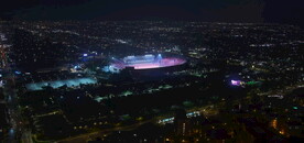 鸟瞰航拍城市体育场馆霓虹夜景
