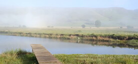 航拍高山云雾湖面鸟瞰水面风光