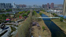 航拍郑州城市公园桥