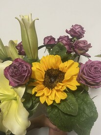 向日葵与紫玫瑰花