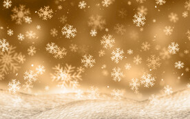 黄底白色雪花渐变背景