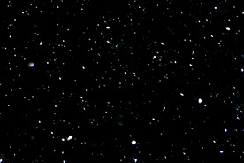 雪花碎片粉尘粒子下落图片素材 