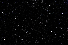 雪花碎片粉尘粒子下落图片素材 