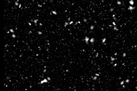 雪花碎片粉尘粒子下落图片素材 