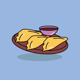 一盘美味炸饺配蘸料