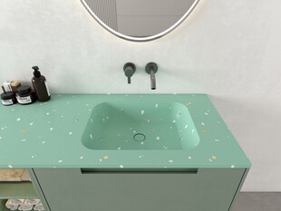 浅绿色洗手台搭配圆形镜