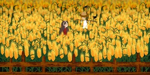 金色玉米田中的人物景象