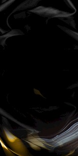 黑色流体中的金色光影