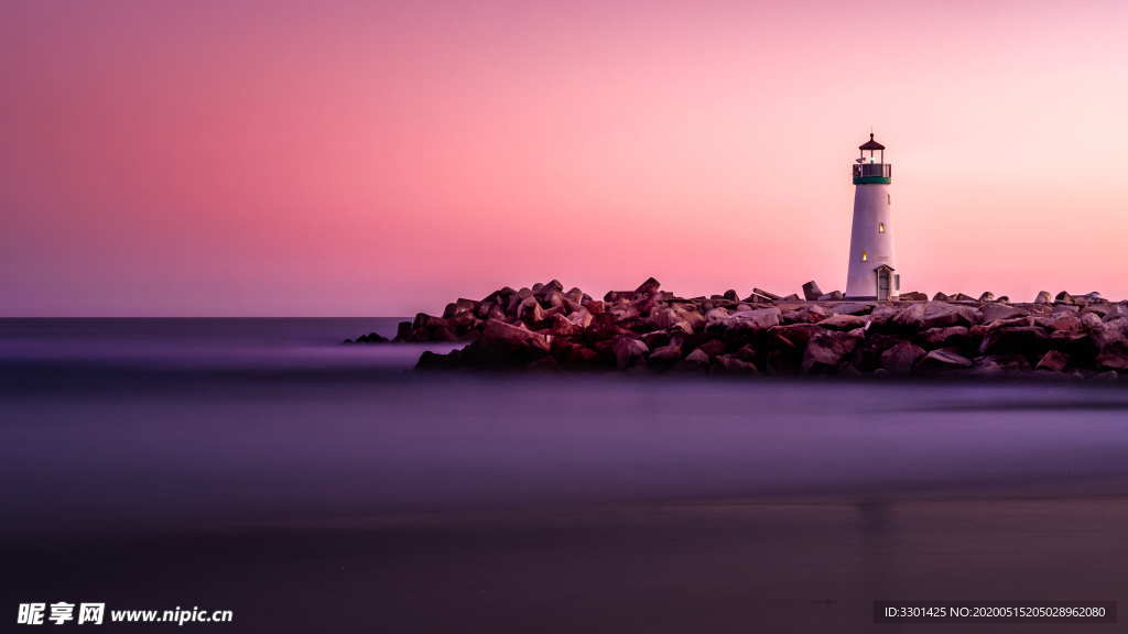 海岸灯塔 晚霞 海边 海堤 岩
