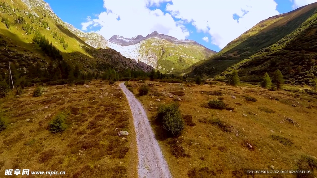 航拍远山峡谷间高速公路