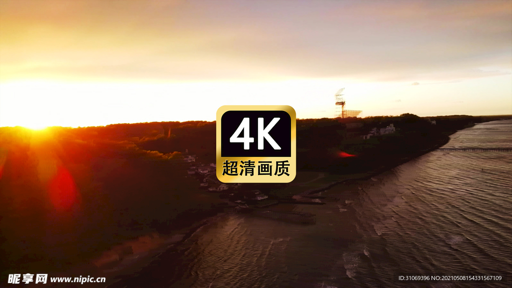 航拍夕阳下的海边森林