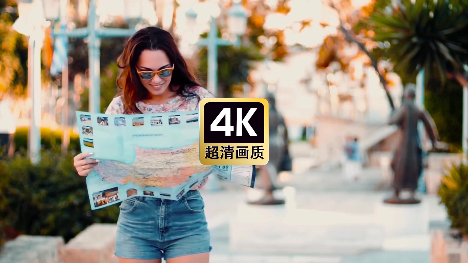 路上戴墨镜看报纸的美女