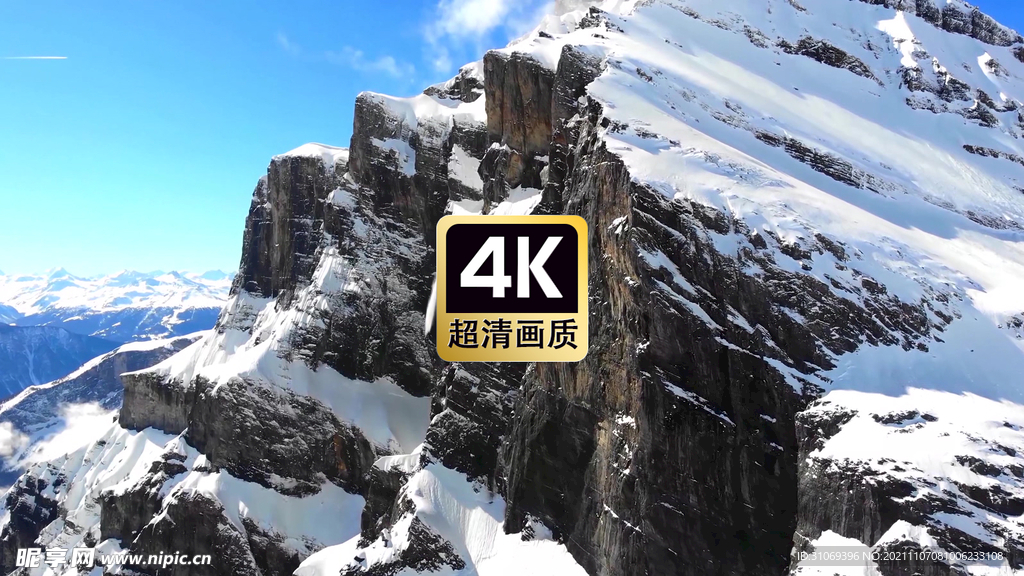 航拍雪山上滑下的积雪