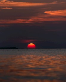 夕阳太阳升起海面落日