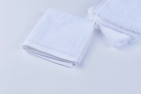 毛巾堆叠卷起图片