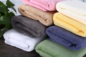 毛巾堆叠卷起图片