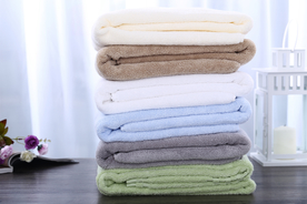 毛巾堆叠卷起图片