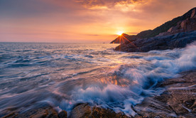 海边石头日落晚霞海浪