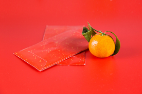 新年橙子红包寓意背景海报素材