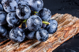 葡萄提子黑布林水果背景海报素材