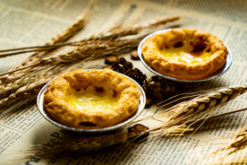 蛋挞零食甜品背景海报素材