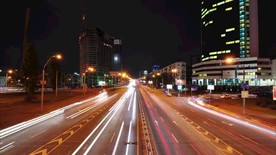 航拍城市道路高速飞驰的车流