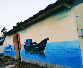 墙上涂鸦鱼船