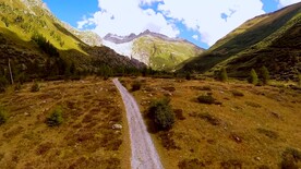 航拍远山峡谷间高速公路