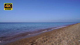 海水缓缓冲上沙滩侧镜头