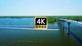 航拍游艇穿越跨海大桥