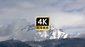 宣传片素材云雾翻滚的雪山山顶