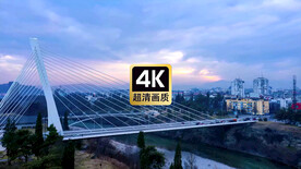 航拍夕阳下的跨海大桥城市群