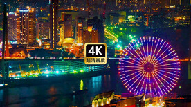 航拍海滨城市建筑群摩天轮