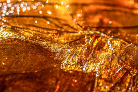 琥珀金磨砂金属质感背景