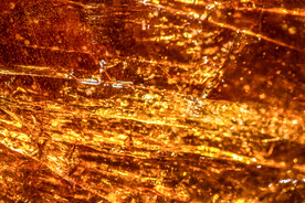 琥珀金磨砂金属质感背景