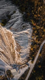 航拍雪山树林道路
