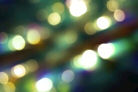 多彩光韵光斑夜空背景