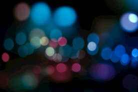 多彩光韵光斑夜空背景