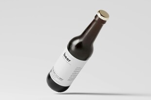 倾斜的棕色啤酒瓶展示图
