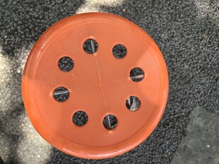 橙色带孔圆盘板凳